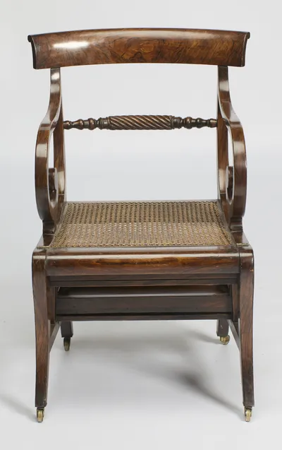 With the squab removed the cane panel fills the seat frame, small brass hinges showing at either end of the seat rail.