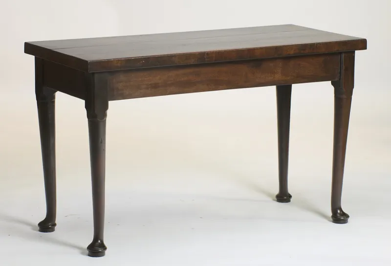 Dark hardwood side table on turned legs with pad feet