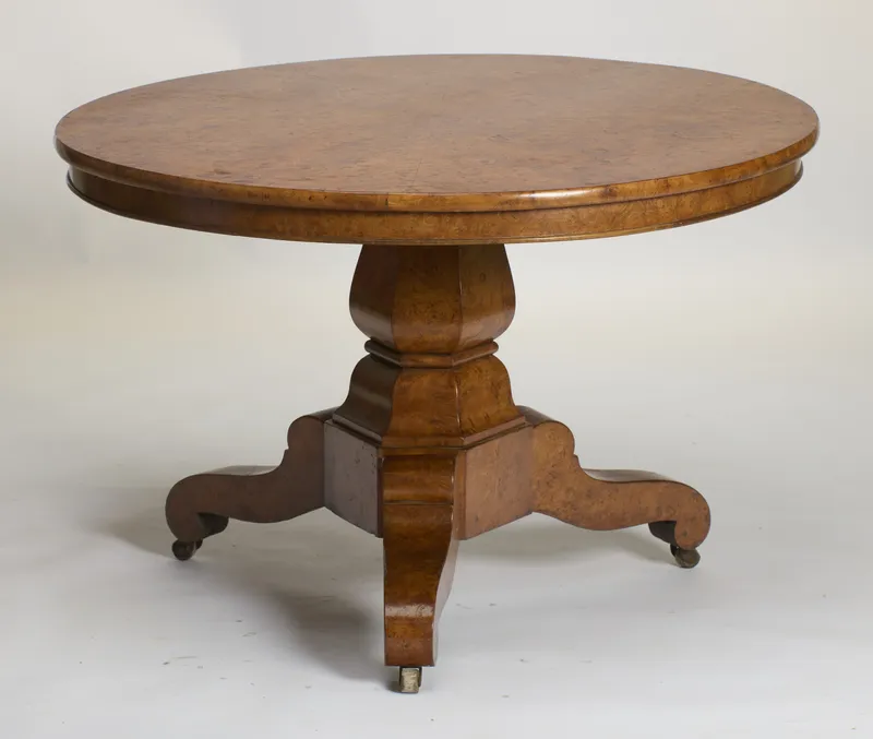 Circular burr-veneered tilt-top centre table