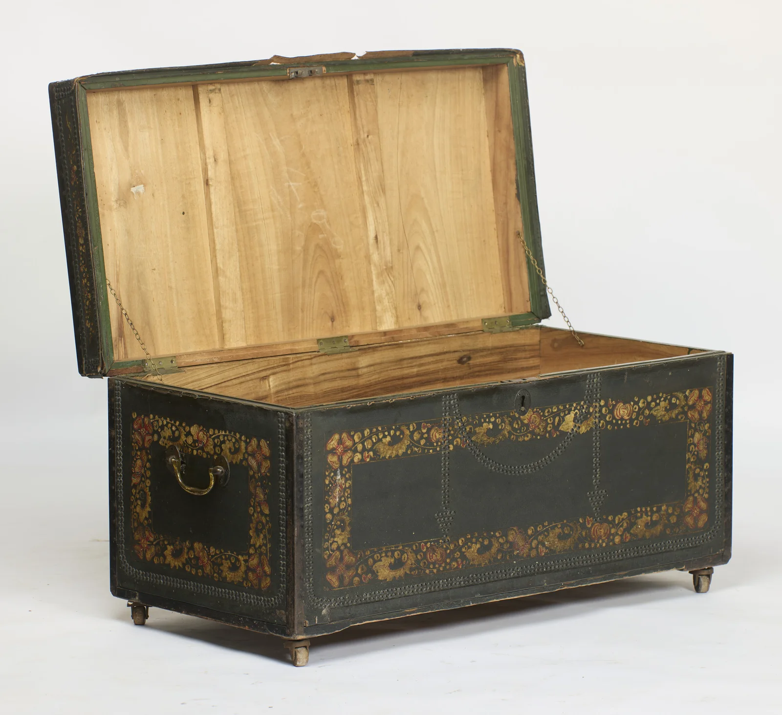 The lid raised on its two retaining chains, the interior and lid underside of plain pale timber, the inner frame of the lid painted green.