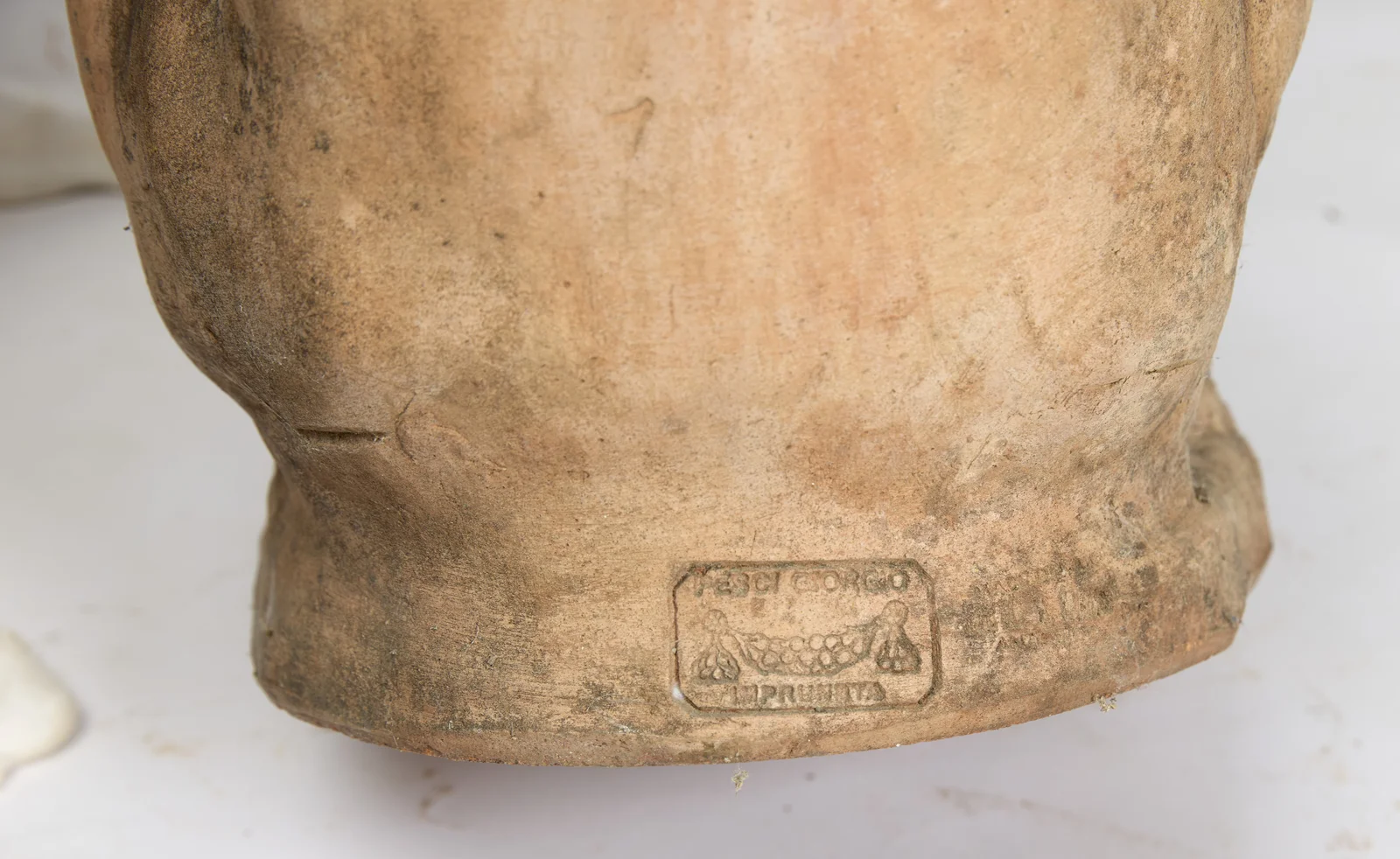 A rectangular stamp in the base reads PESCI GIORGIO over a fruiting garland, with IMPRUNETA beneath.